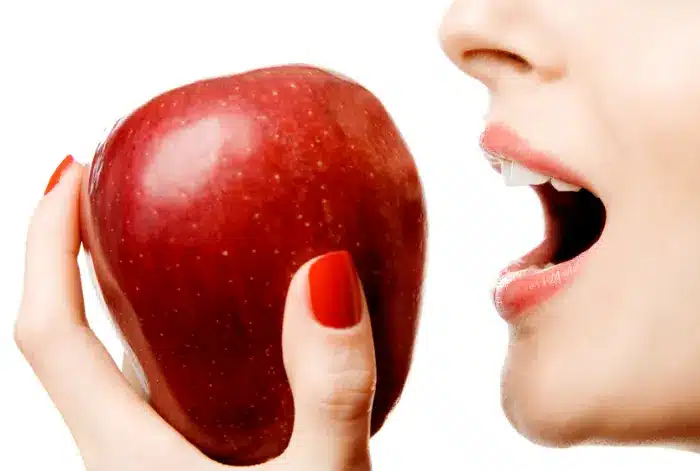 Woman eating fruits